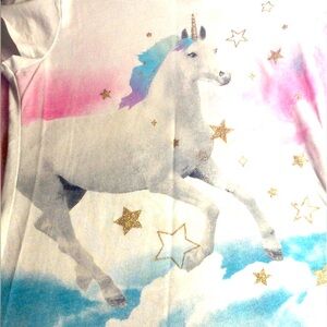 Girls wonder nation charging unicorn t shirt.